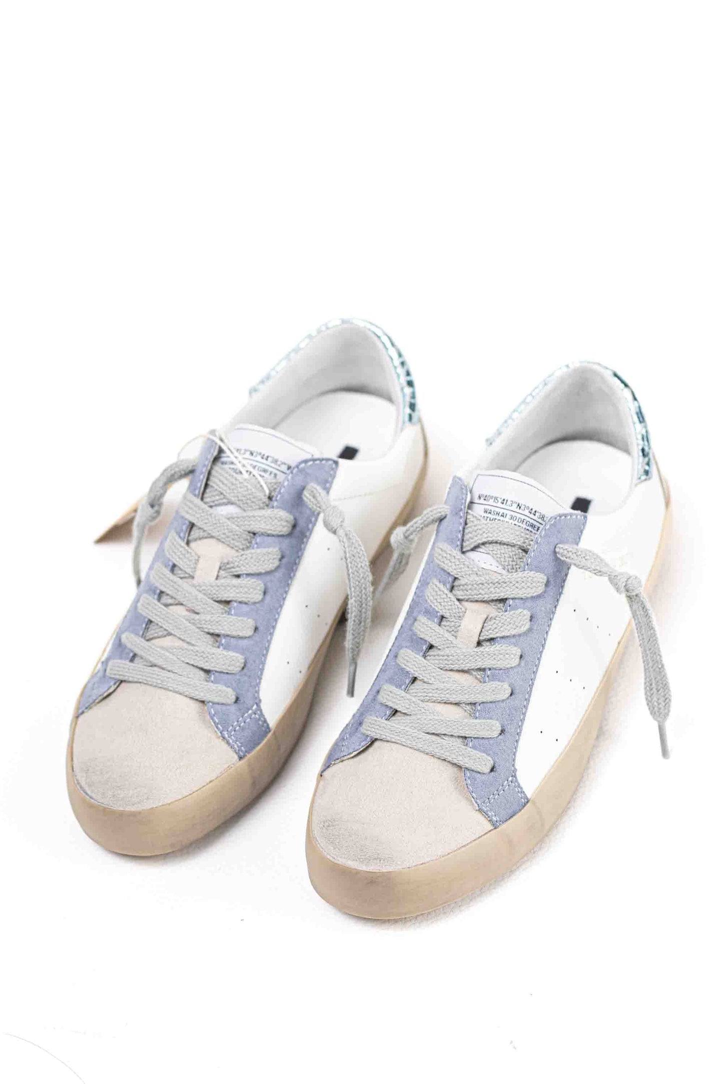 Zapatilla deportiva estilo retro en combinación de materiales Corina