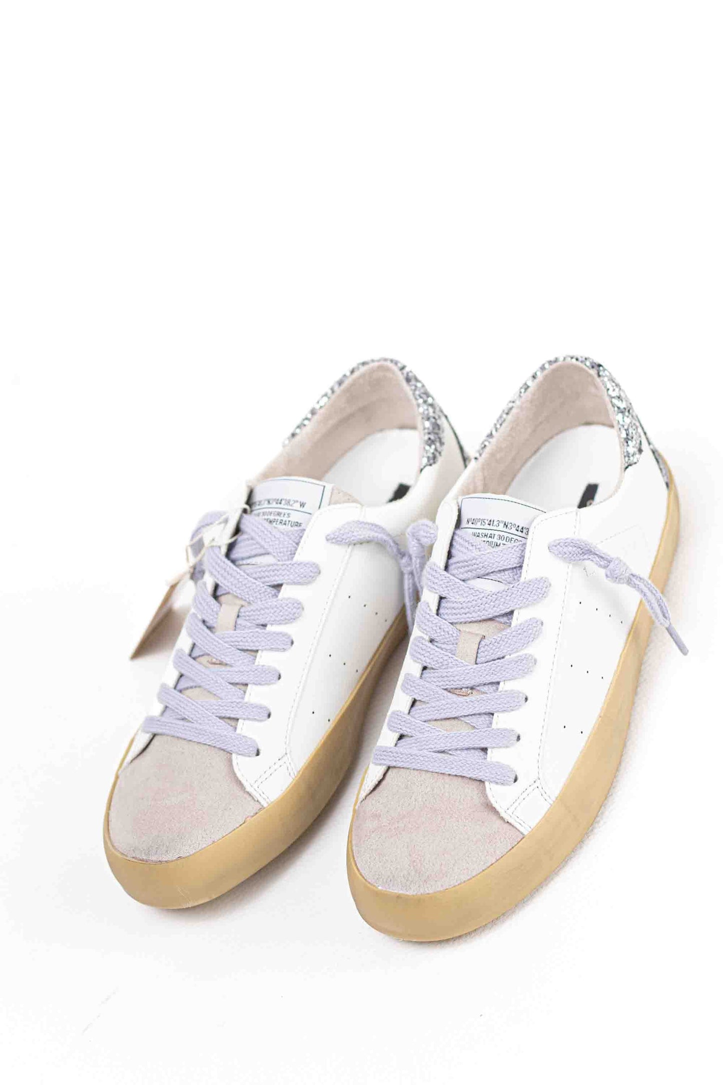 Zapatilla deportiva estilo retro en combinación de materiales Corina