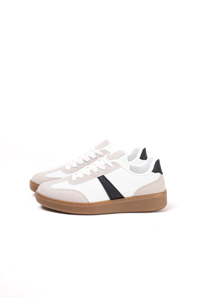 Zapatillas deportivas blancas para mujer con detalle en negro, estilo clásico y moderno para el uso diario