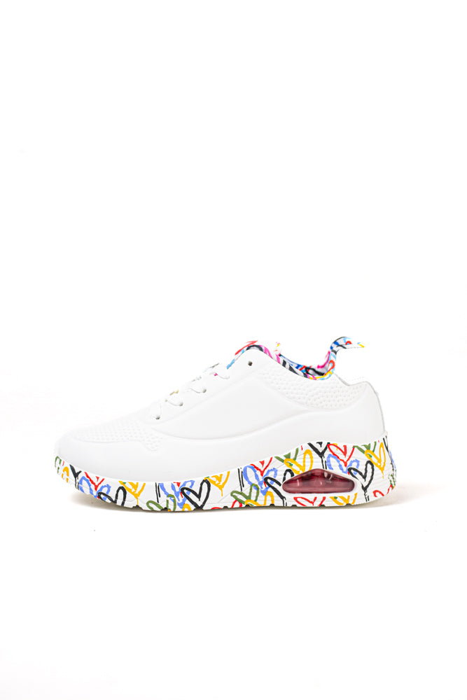 Zapatillas blancas para mujer con suela de colores vibrantes, expresión audaz y estilo dinámico para la vida urbana
