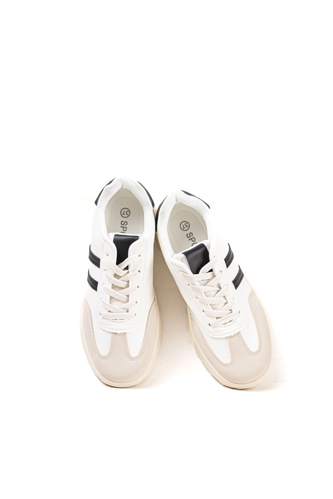 Zapatillas deportivas para mujer en blanco y negro, estilo clásico con un toque moderno para la actividad diaria