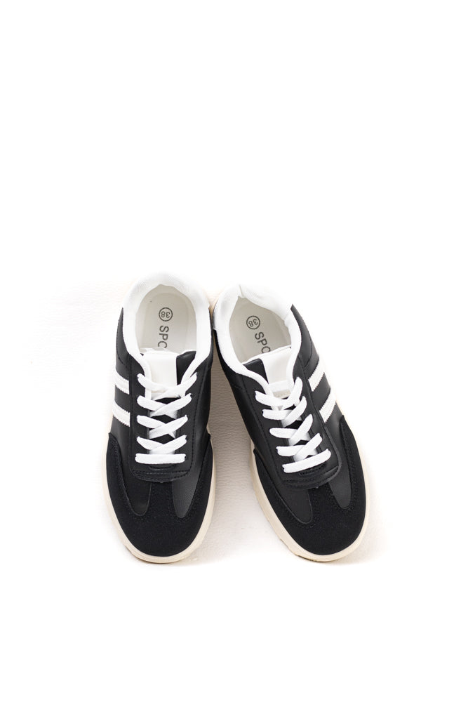 Zapatillas deportivas para mujer en blanco y negro, estilo clásico con un toque moderno para la actividad diaria