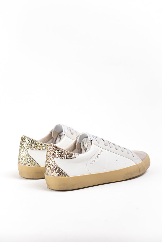 Zapatilla deportiva estilo retro en combinación de materiales Corina