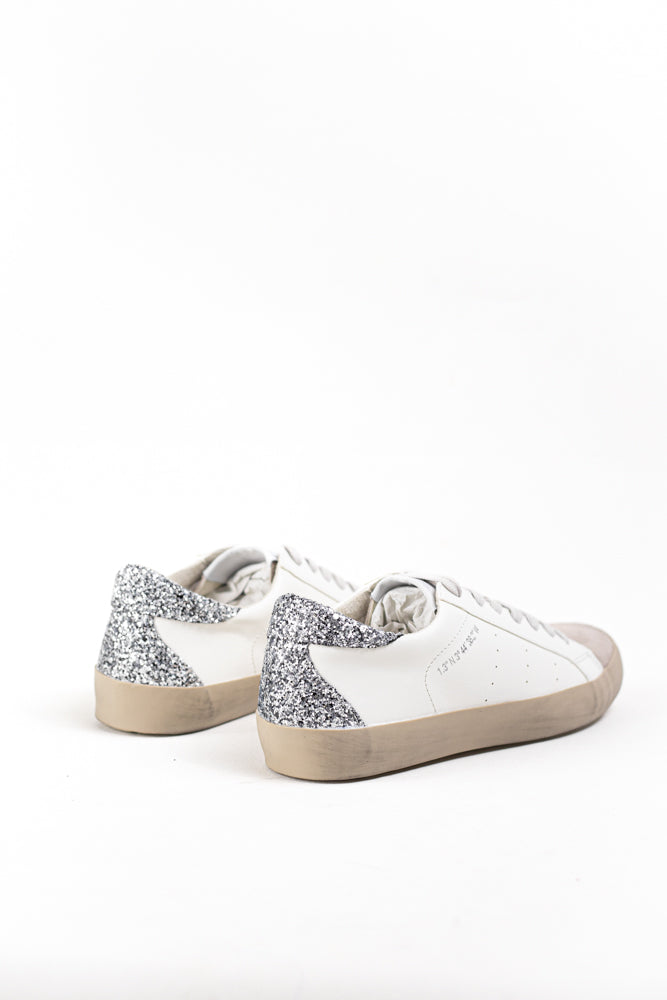 Zapatilla deportiva estilo retro en combinación de materiales Corina