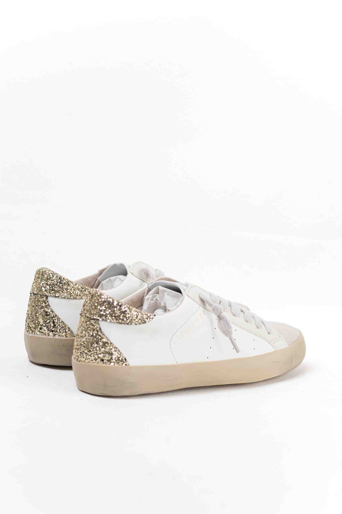 zapatilla deportiva estilo retro en combinacion de materiales Oro 40