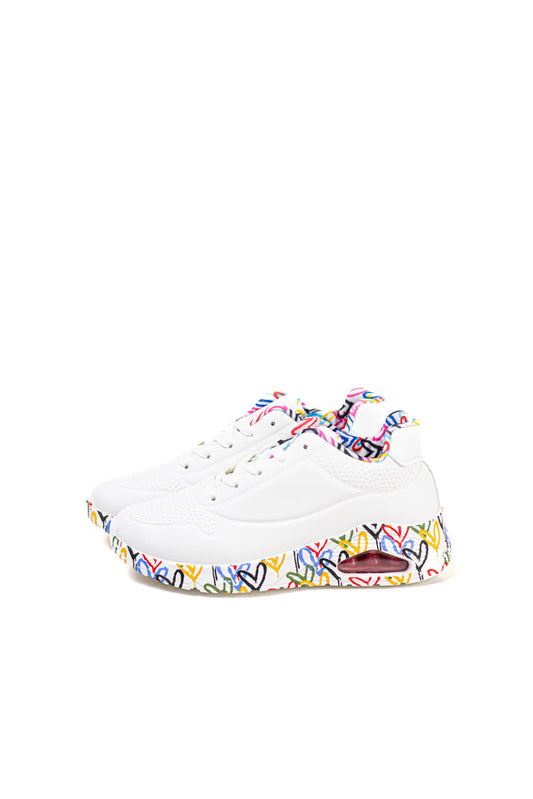 Zapatillas blancas para mujer con suela de colores vibrantes, expresión audaz y estilo dinámico para la vida urbana