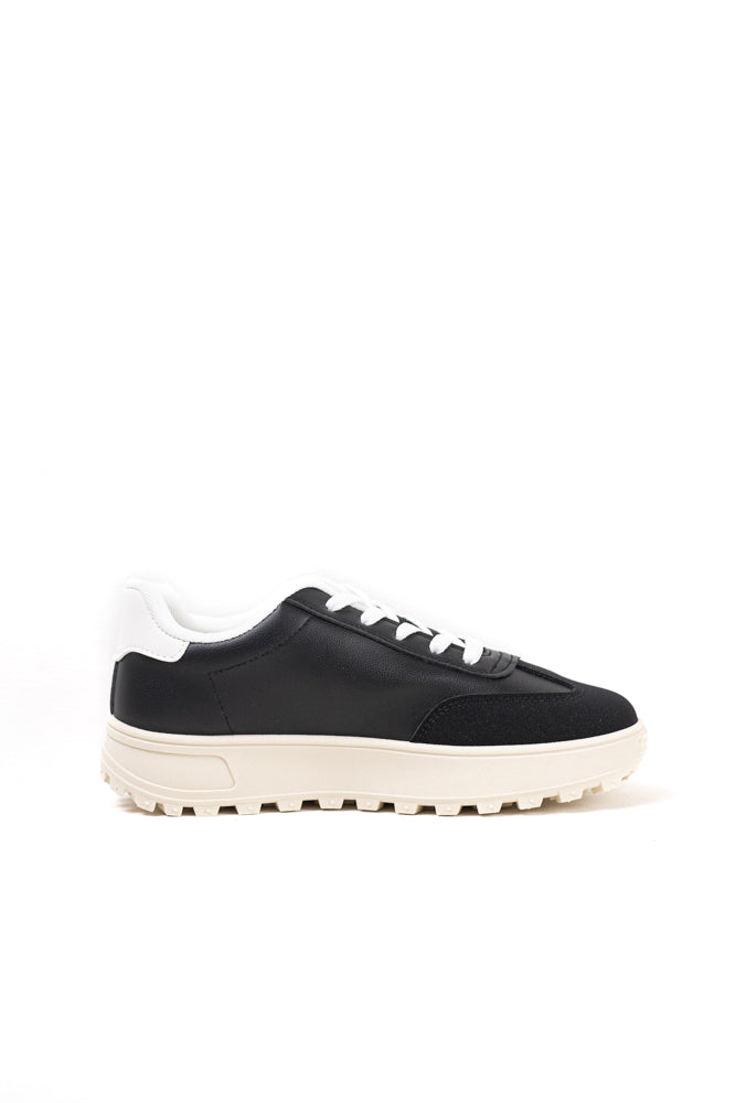 Zapatillas deportivas para mujer en blanco y negro, estilo clásico con un toque moderno para la actividad diaria