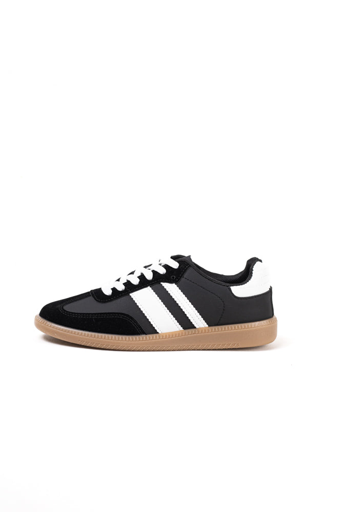 Zapatillas deportivas blancas para mujer con franjas negras, estilo clásico y comodidad para el uso diario