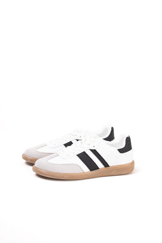 Zapatillas deportivas blancas para mujer con franjas negras, estilo clásico y comodidad para el uso diario