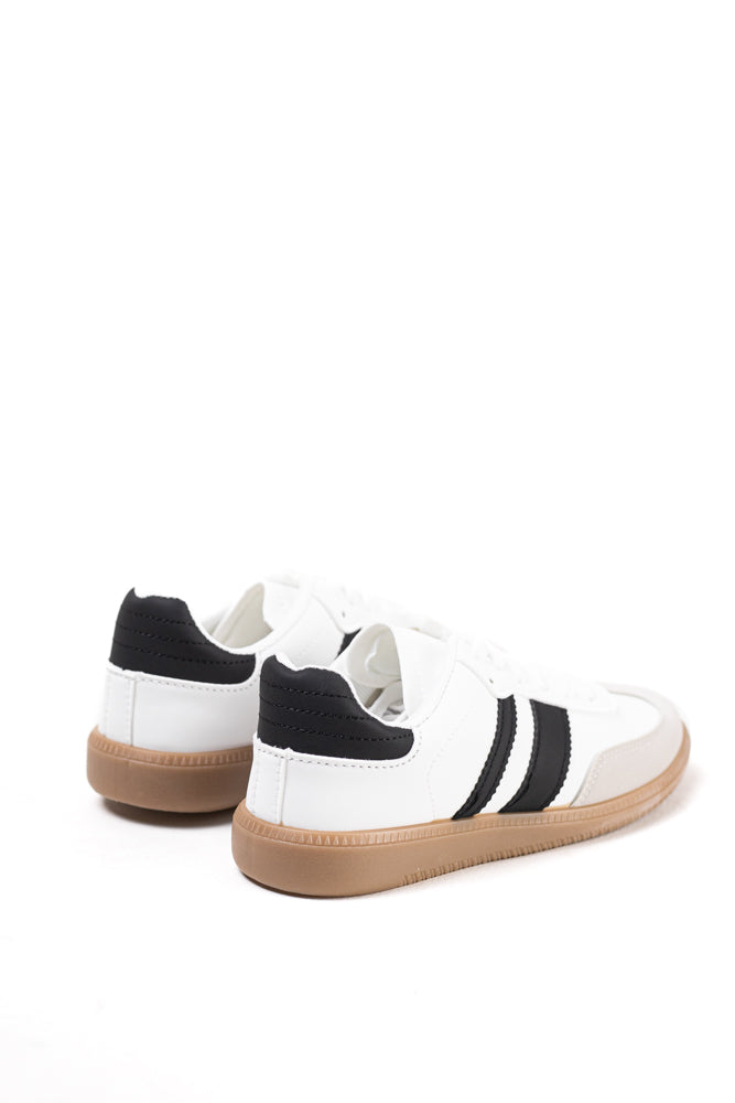 Zapatillas deportivas blancas para mujer con franjas negras, estilo clásico y comodidad para el uso diario