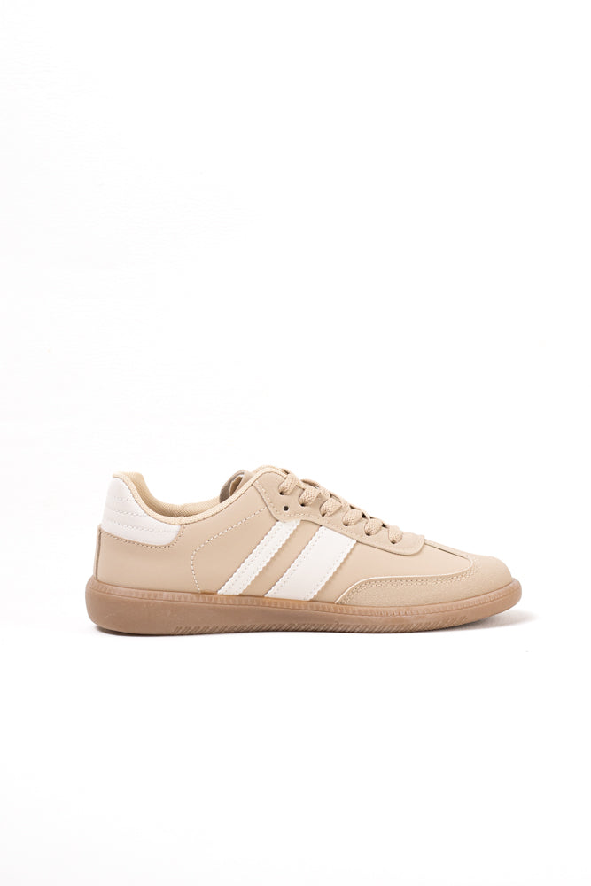 Zapatillas deportivas blancas para mujer con franjas negras, estilo clásico y comodidad para el uso diario
