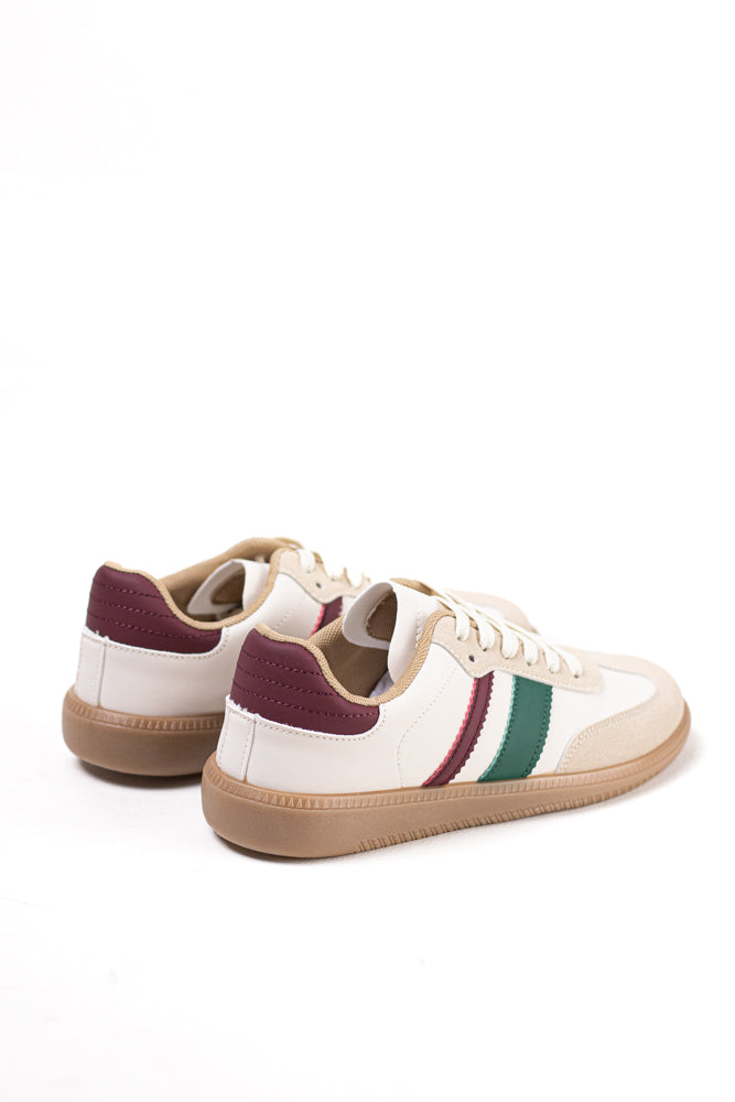 Zapatillas deportivas blancas para mujer con franjas negras, estilo clásico y comodidad para el uso diario