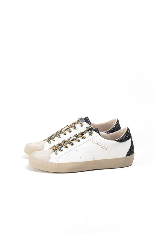 Zapatilla deportiva estilo retro en combinación de materiales Corina