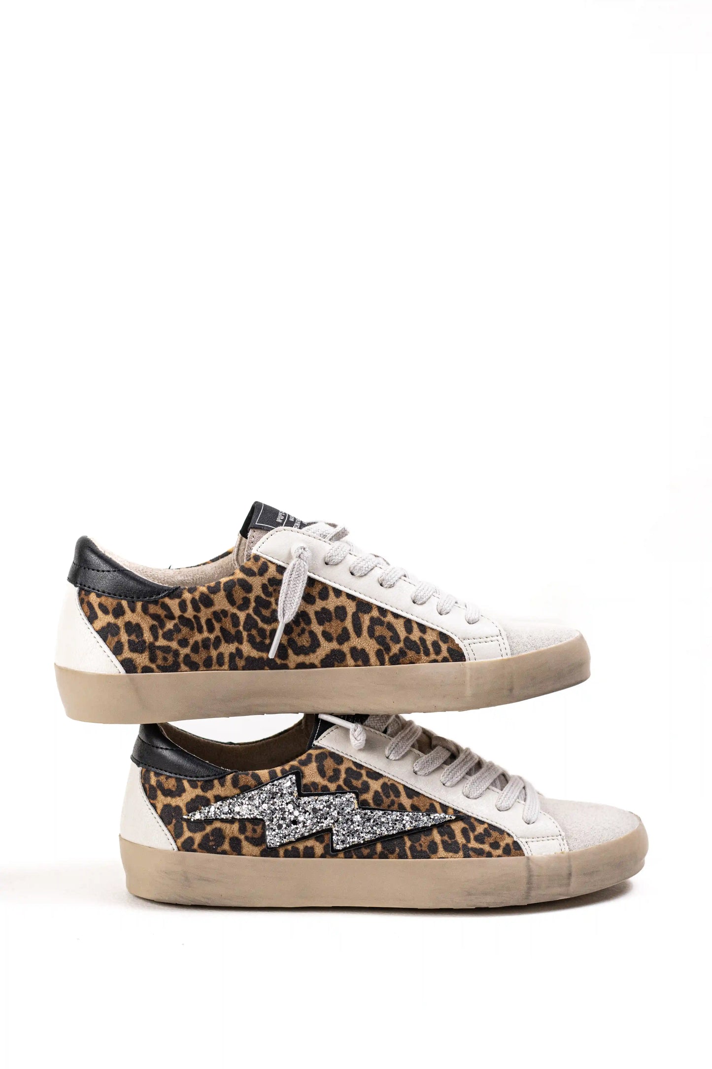 Zapatillas mujer casual urbanas con glitter, detalle rayo lateral y suela de goma cómoda para looks modernos Corina